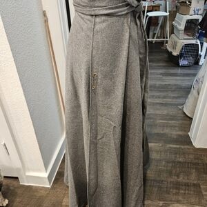 Women's Wrap Skirt with large pin for closure.